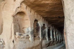 Ruins of grottoes carved into the mountains at Zhangye